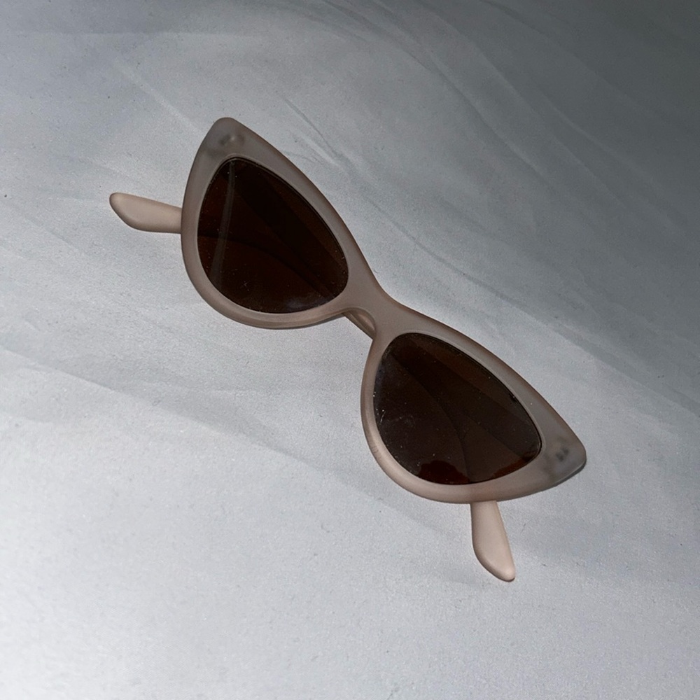 Translucent light pink mirror cat eye sunglasses